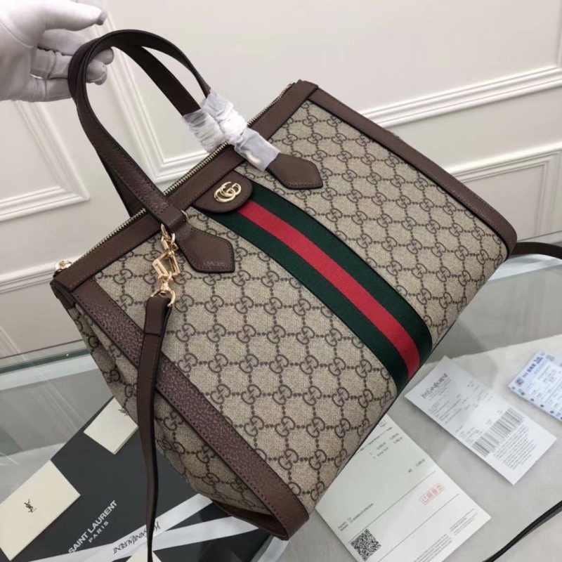 G*u*i shopping bags